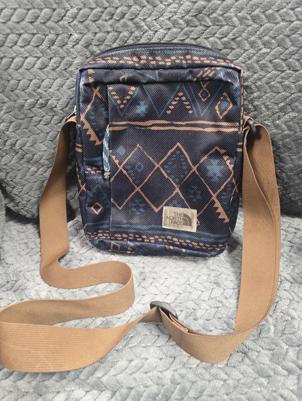 The North Face Navy Patterned Crossbody with Tan Strap